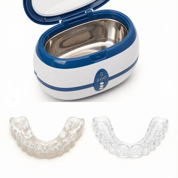GT SONIC ultrasonic cleaner with cloudy and clean retainers showing buildup difference