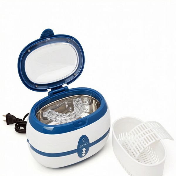 GT SONIC ultrasonic cleaner with retainer submerged in tank and bubbles