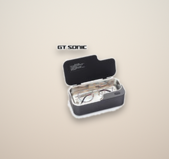 Ultrasonic glasses cleaner removing buildup from eyeglasses